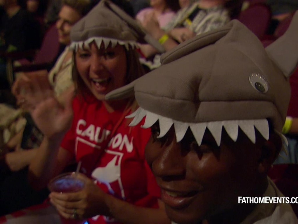 This guy is REALLY enjoying his shark hat.